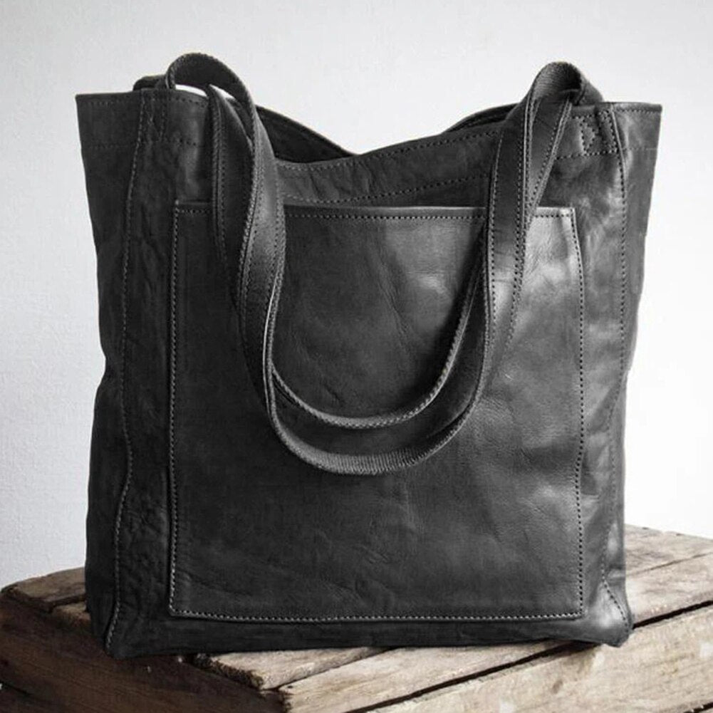 Elegante Damen Lederhandtasche, stilvoll und vielseitig, mit geräumigem Innenraum, ideal für Büro und Freizeit.