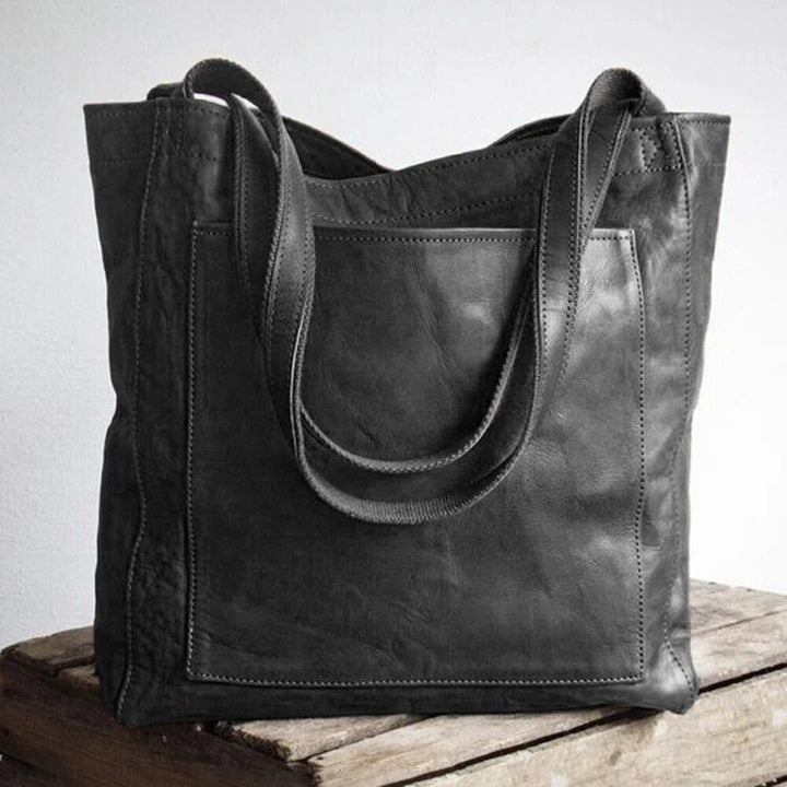 Elegante Damen Lederhandtasche, stilvoll und vielseitig, mit geräumigem Innenraum, ideal für Büro und Freizeit.