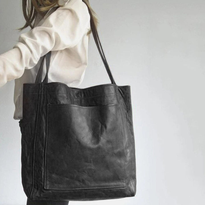 Elegante Damen Lederhandtasche, stilvoll und vielseitig, mit geräumigem Innenraum, ideal für Büro und Freizeit.