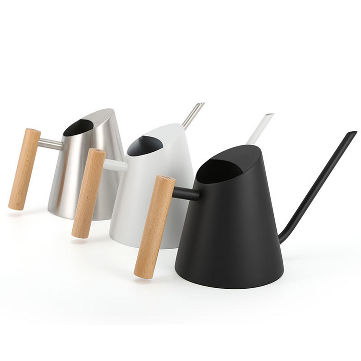 "Elegante Gießkanne mit ergonomischem Holzgriff, ideal für stilvolles Gießen im Garten. Mattes Weiß, langlebig, 900ML Kapazit