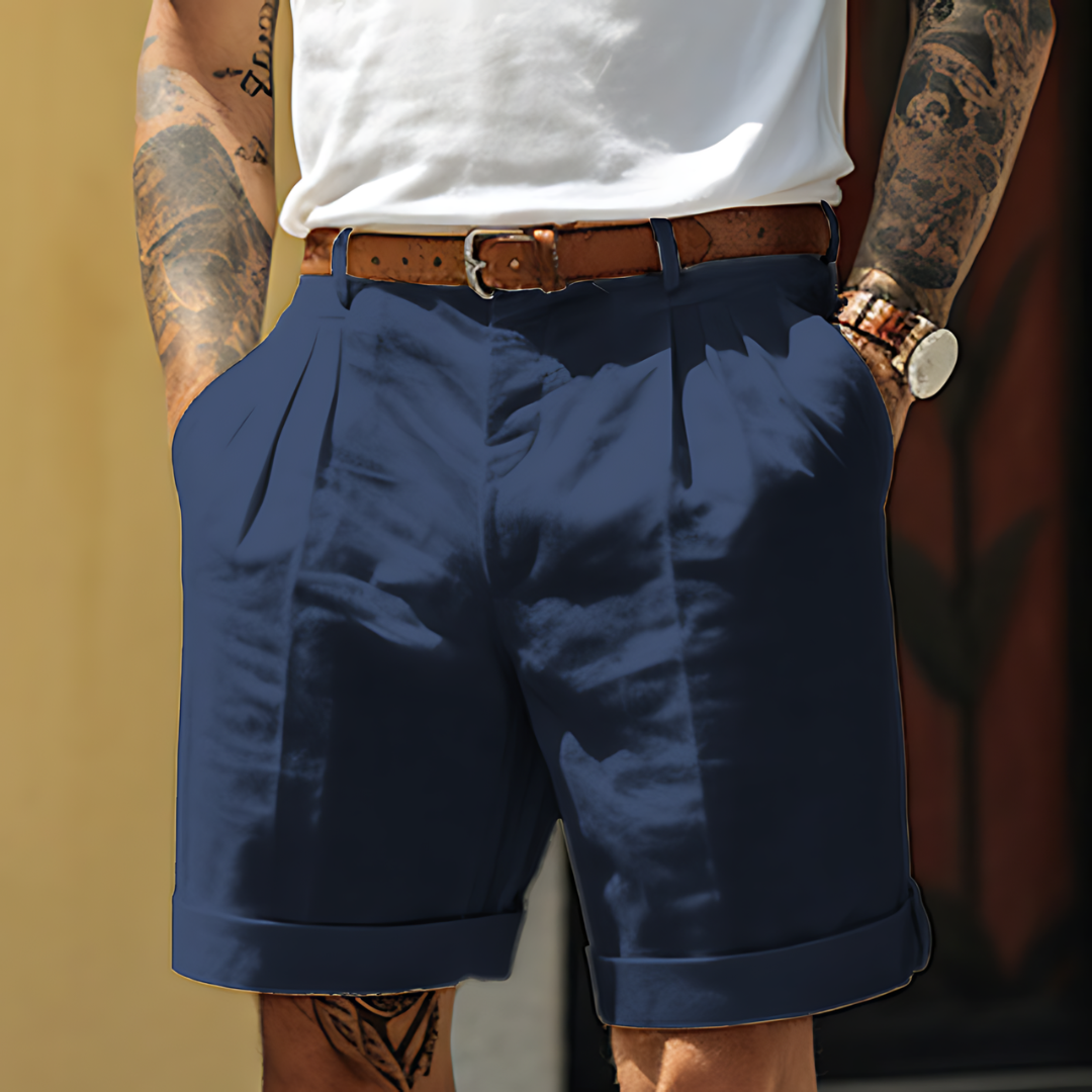 "Elegante Herrenshorts aus Baumwolle, locker geschnitten, mit Knopfleiste und Taschen, ideal für Freizeit und Büro."