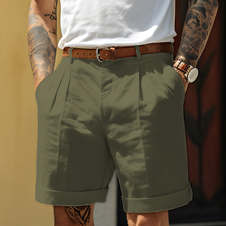 "Elegante Herrenshorts aus Baumwolle, locker geschnitten, mit Knopfleiste und Taschen, ideal für Freizeit und Büro."