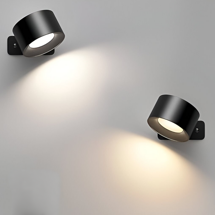 "Elegante kabellose Wandleuchte, schwarz, seitliche Ansicht, dimmbare LED mit 360° drehbarem Licht, flexibel positionierbar."