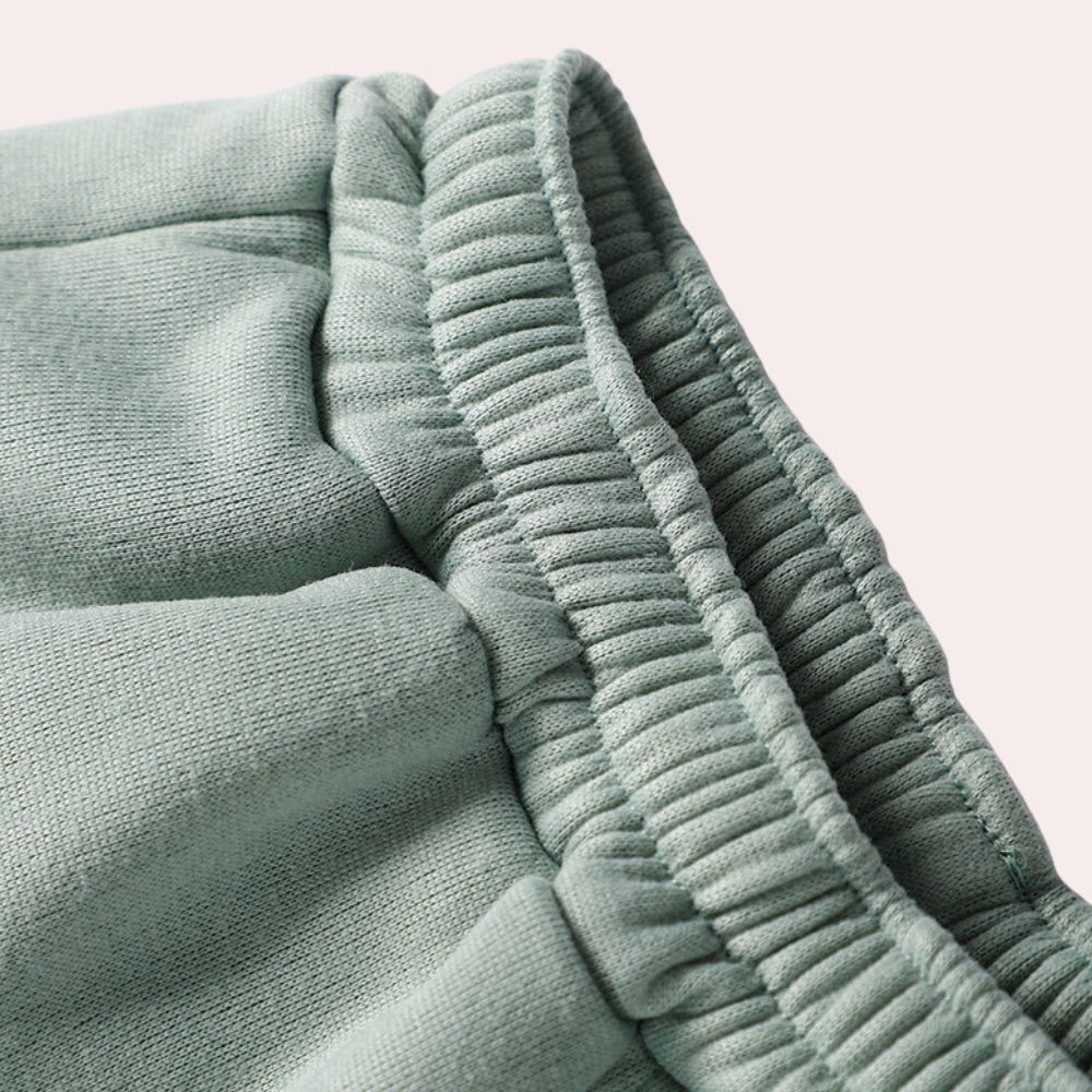 "Eleganter Damen Jogginganzug in Pink, weich, bequem und vielseitig für Sport und Freizeit."