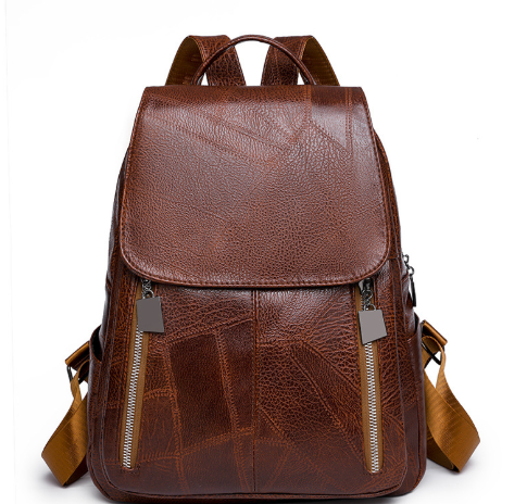 "Eleganter diebstahlsicherer Damen-Lederrucksack, Vorderansicht, stilvolles Design in Braun, Dunkelrot oder Schwarz."