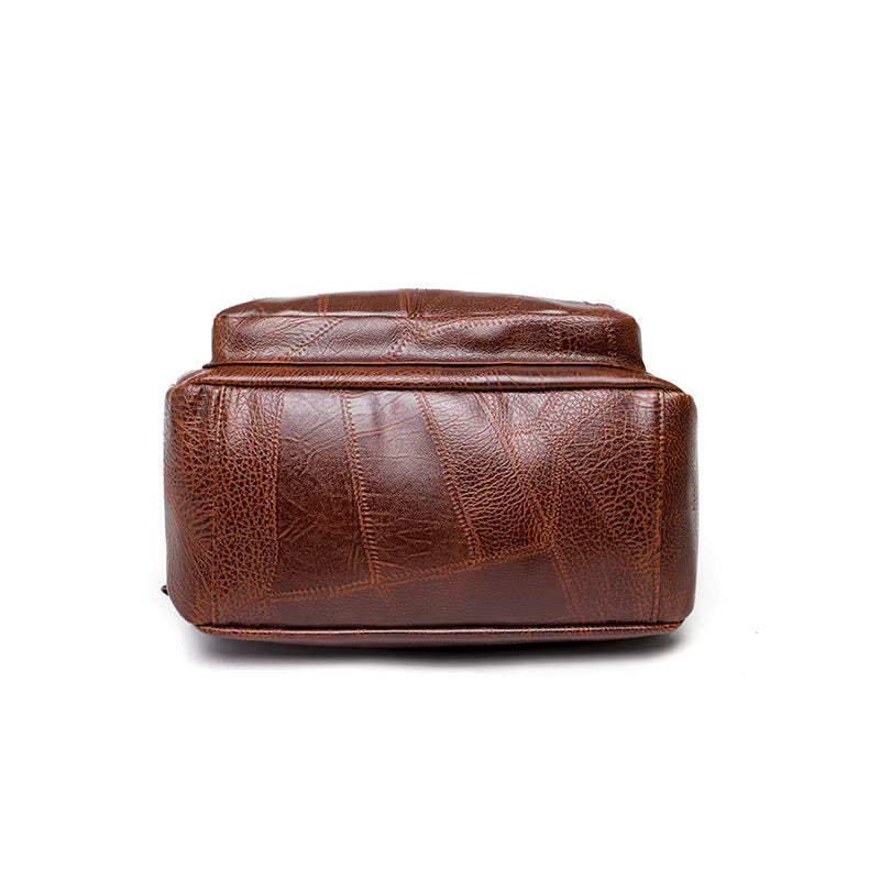 "Eleganter diebstahlsicherer Damen-Lederrucksack, Vorderansicht, stilvolles Design in Braun, Dunkelrot oder Schwarz."