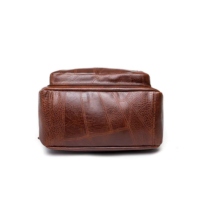 "Eleganter diebstahlsicherer Damen-Lederrucksack, Vorderansicht, stilvolles Design in Braun, Dunkelrot oder Schwarz."