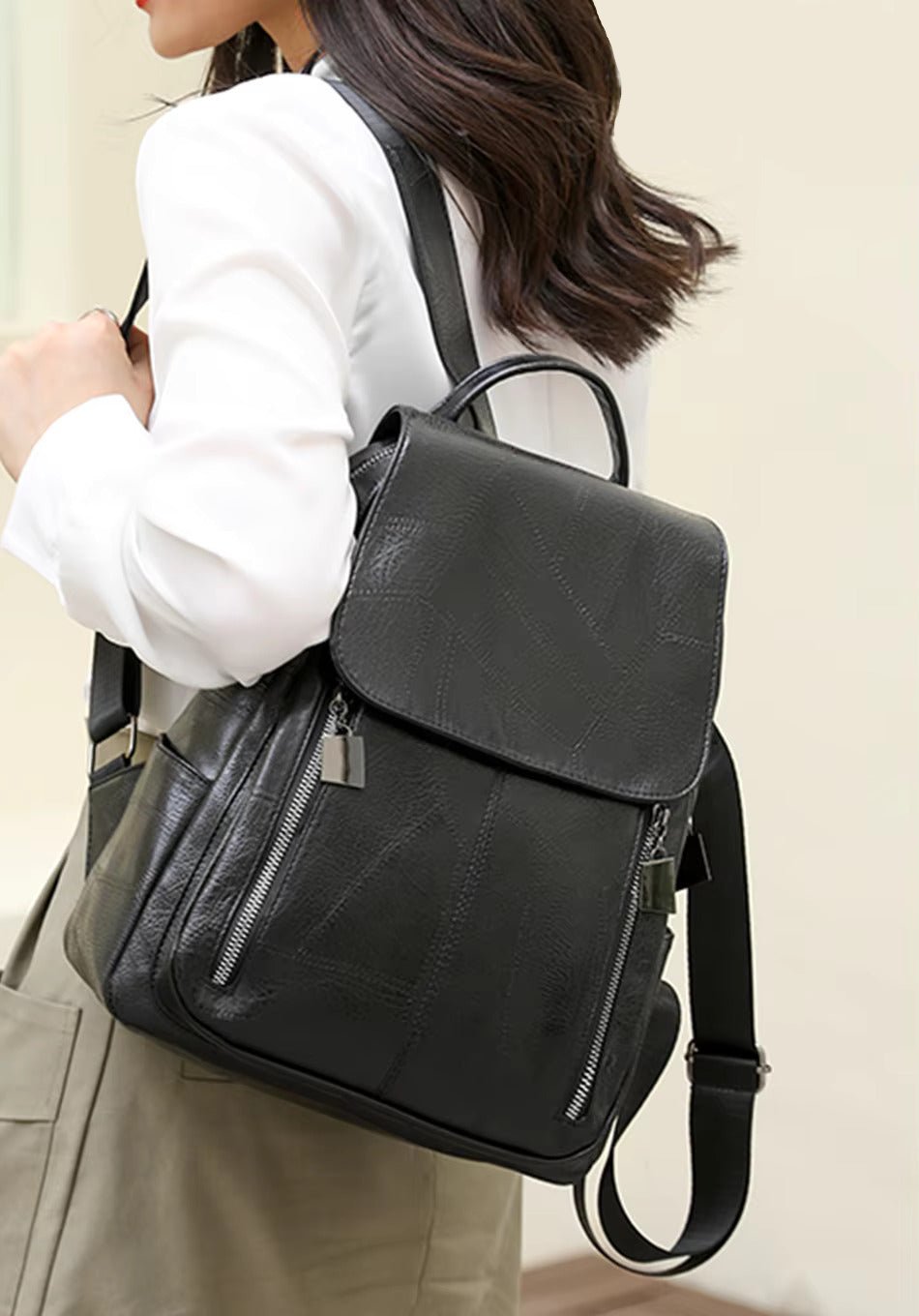"Eleganter diebstahlsicherer Damen-Lederrucksack, Vorderansicht, stilvolles Design in Braun, Dunkelrot oder Schwarz."