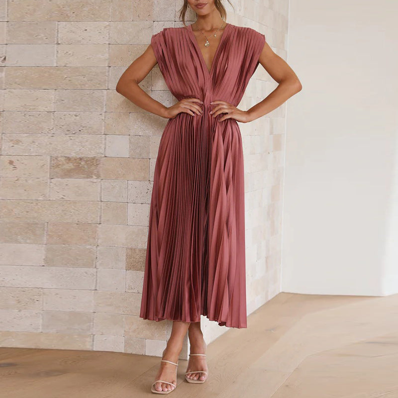 Elegantes Damen-Sommerkleid mit V-Ausschnitt, fließender Stoff, rückenfrei, ideal für Events oder Abendessen.