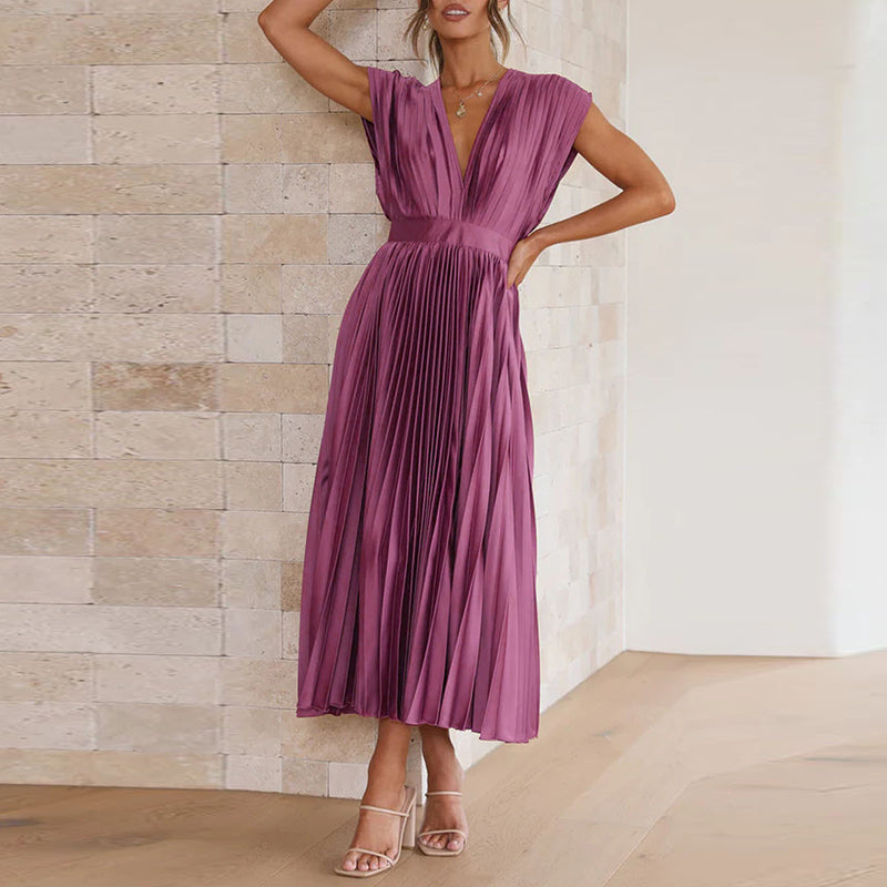 Elegantes Damen-Sommerkleid mit V-Ausschnitt, fließender Stoff, rückenfrei, ideal für Events oder Abendessen.