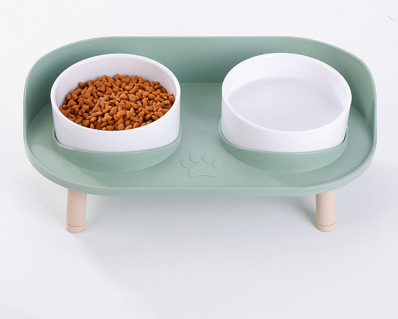 Elevated pet feeder with non-slip ceramic bowls for small to medium dogs and cats, ergonomic design