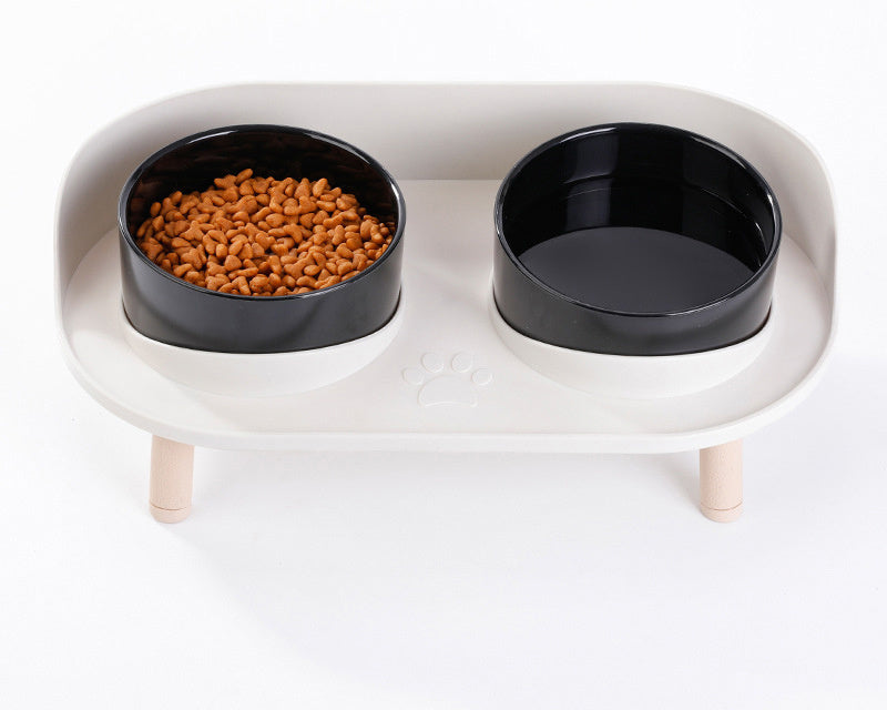 Ergonomic elevated pet feeder with two ceramic bowls, promoting healthy posture for small to medium pets