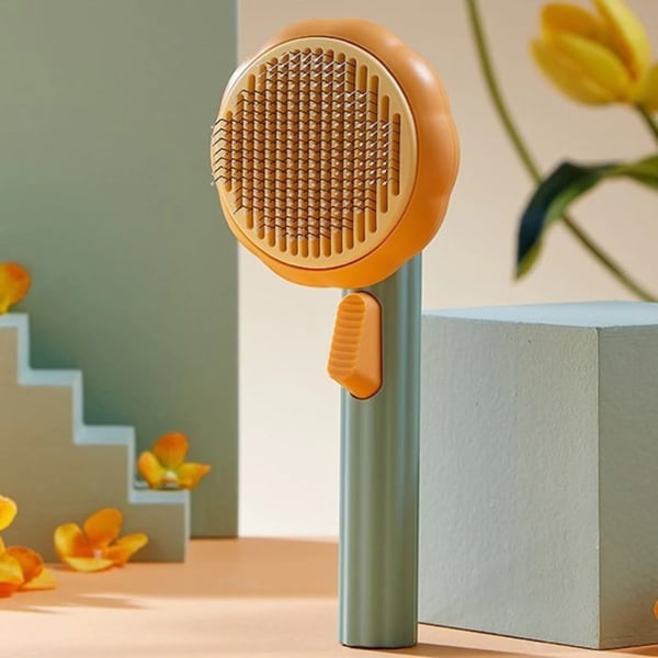 Ergonomic pet grooming brush for dogs and cats, blue, gently removing loose fur from all coat types.