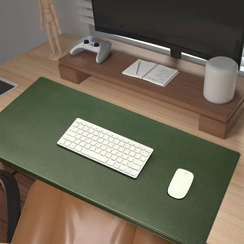 Sleek PU leather ergonomic desk mat with wrist rest, perfect computer accessory for clean desk.