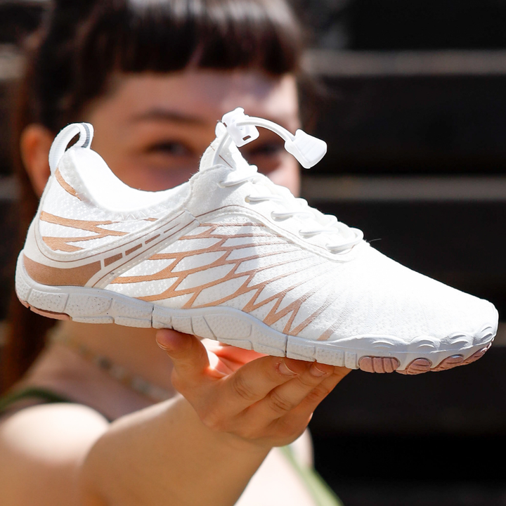 "Ergonomische FloraX Pro Barfußschuhe aus atmungsaktivem Material mit rutschfester, flexibler Sohle und wasserdichtem Design.