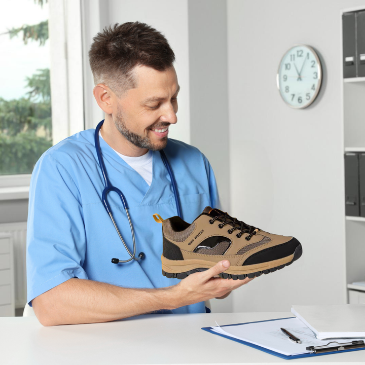 Ergonomische Hallux Damenschuhe, graues atmungsaktives Material, breite Zehenbox, druckfreie Passform, bequeme Sohle.