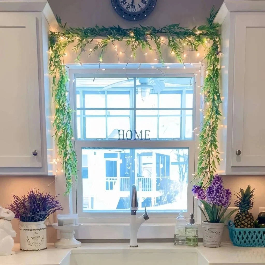 Flexible wire holiday garland with warm glow LED ornaments for versatile festive displays & home decor.