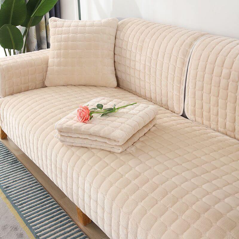 Soft flannel sofa protector, square quilted design, ideal for pet-friendly home decor