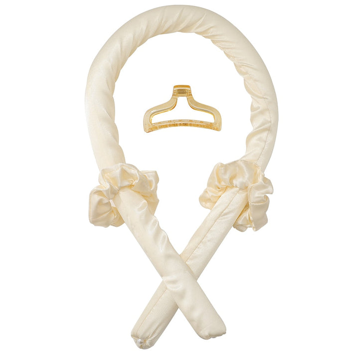 Flexibler Lockenwickler für sanfte Wellen, pastellfarben, weiches Material für gesundes Styling ohne Hitze.