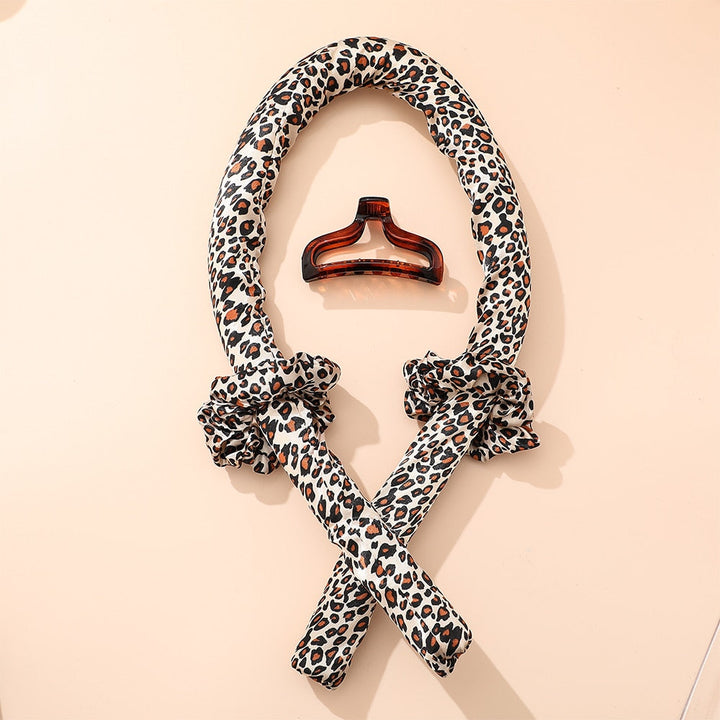 Flexibler Lockenwickler für sanfte Wellen, pastellfarben, weiches Material für gesundes Styling ohne Hitze.