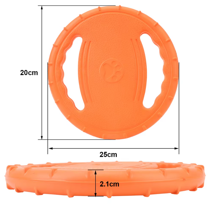 Dog chewing on a red floating teething ring, promoting dental health during play