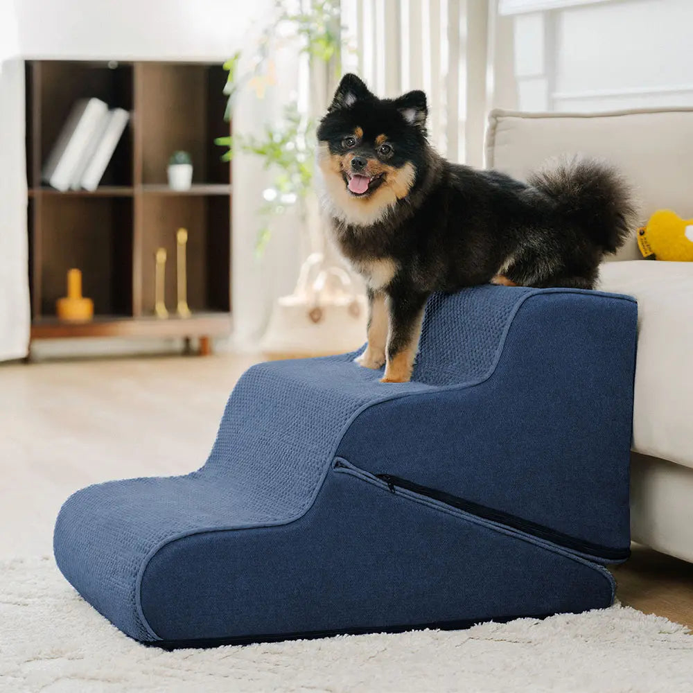 Multifunctional pet mobility aid, foldable 2-in-1 dog stairs and ramp in a home setting, grey finish.