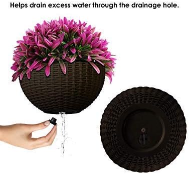 "Geflochtener Hängekorb mit natürlicher Optik, Kette zum Aufhängen, ideal für Balkon- und Gartendekor."