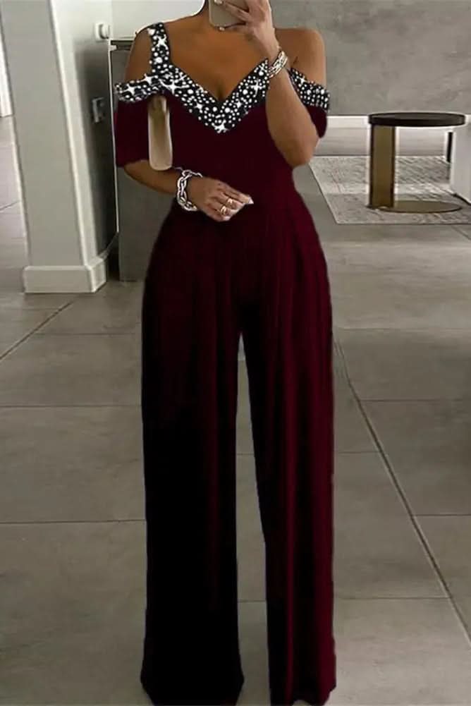 Glamorous women's rhinestone jumpsuit perfect for evening wear, parties, and special occasions. Elegant one-piece sparkle outfit.
