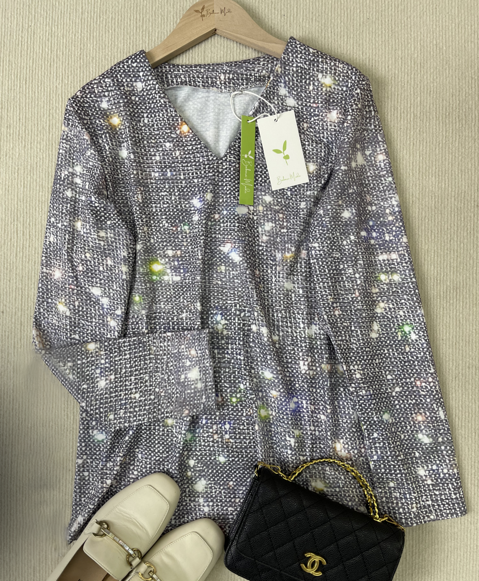 "Glitzernde Damen Langarmbluse mit funkelndem Design, elegant und stilvoll für glamouröse Anlässe, in klassischem Schnitt."