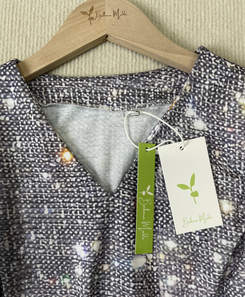 "Glitzernde Damen Langarmbluse mit funkelndem Design, elegant und stilvoll für glamouröse Anlässe, in klassischem Schnitt."