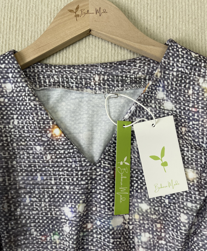 "Glitzernde Damen Langarmbluse mit funkelndem Design, elegant und stilvoll für glamouröse Anlässe, in klassischem Schnitt."