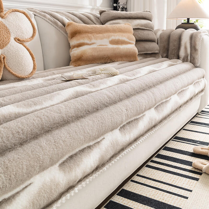 Non-shedding Gradient Stripe Plush Couch Cover draped over a three-seater sofa, modern home decor