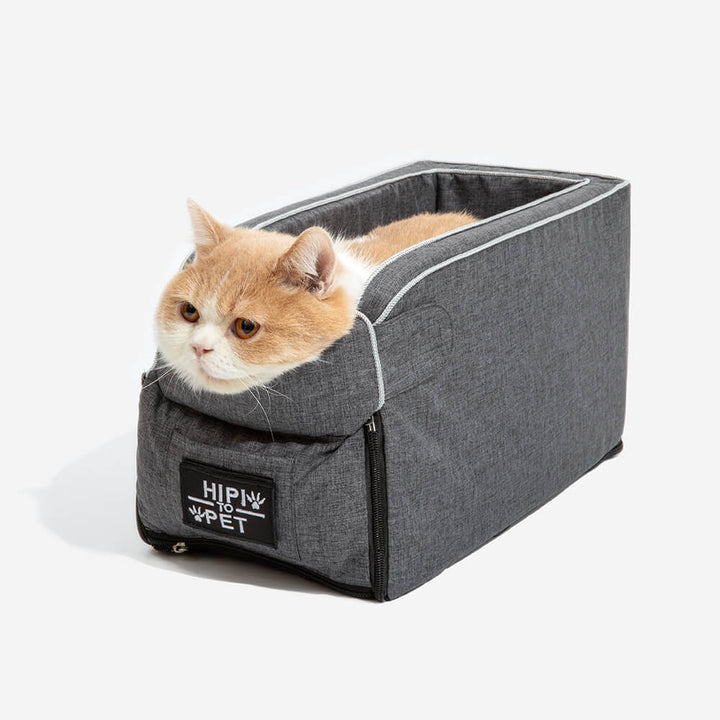 Grey suede dog car booster seat for safe pet travel, front view.