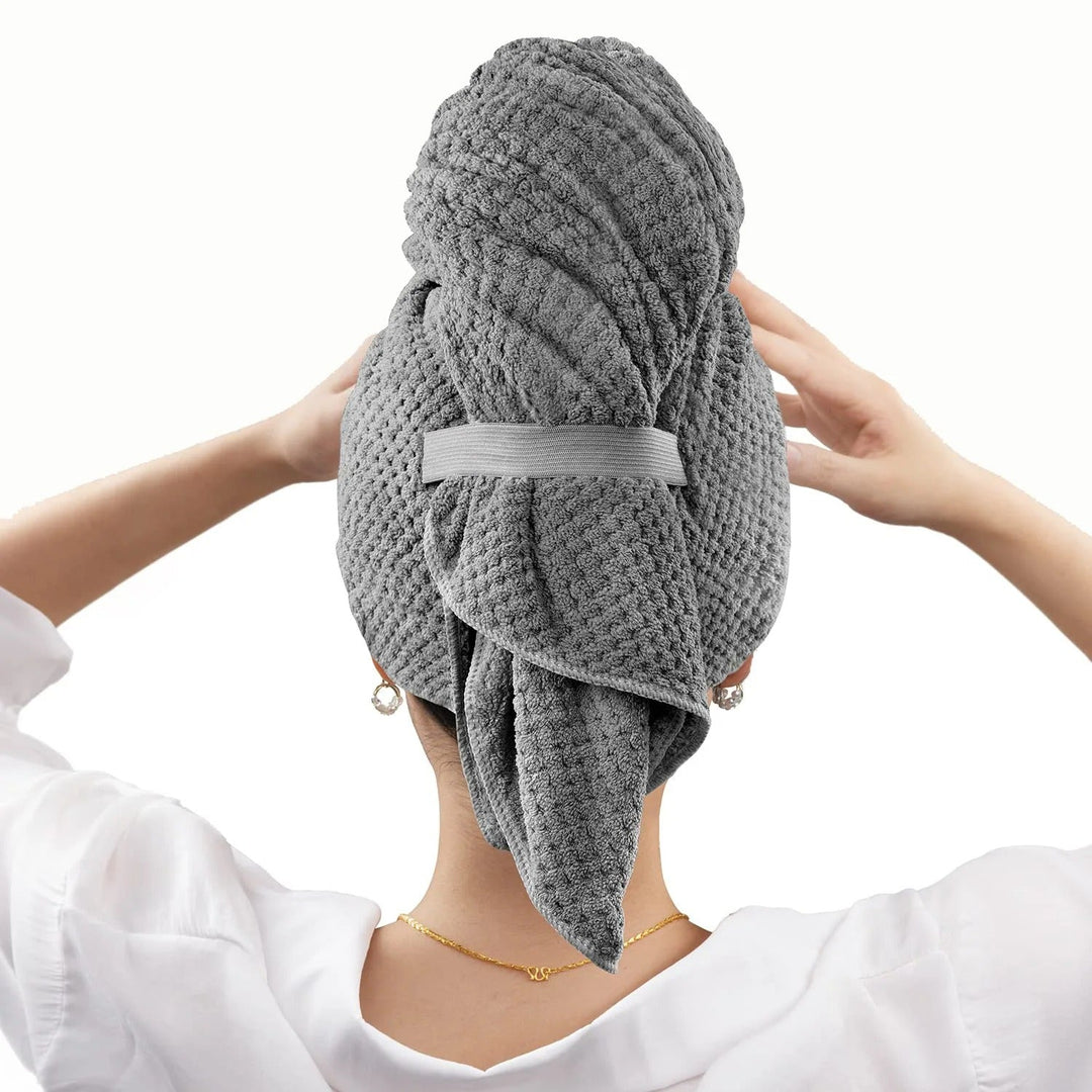 Unisex ultra-absorbent microfiber hair towel wrap for fast drying & anti-frizz hair care.