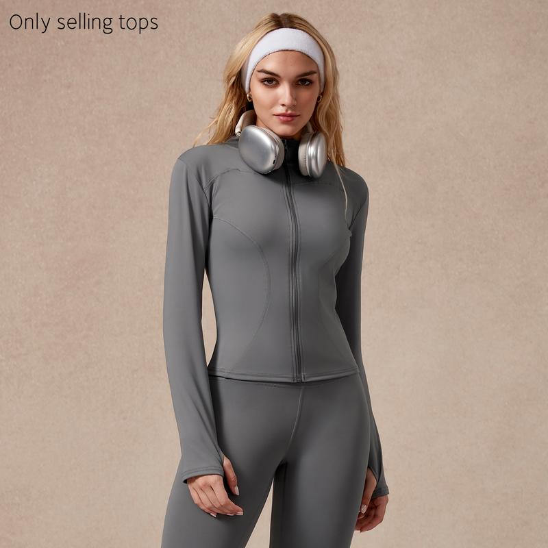 Athletic sculpted performance full-zip top, women's gymwear for yoga and sports.