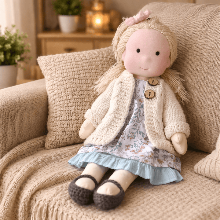 Educational Waldorf doll, handmade cotton toy encouraging creative play & development.