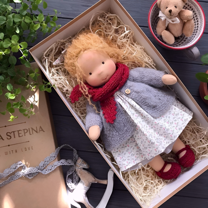 Imaginative play Waldorf doll, a handmade wool and organic cotton children's toy.