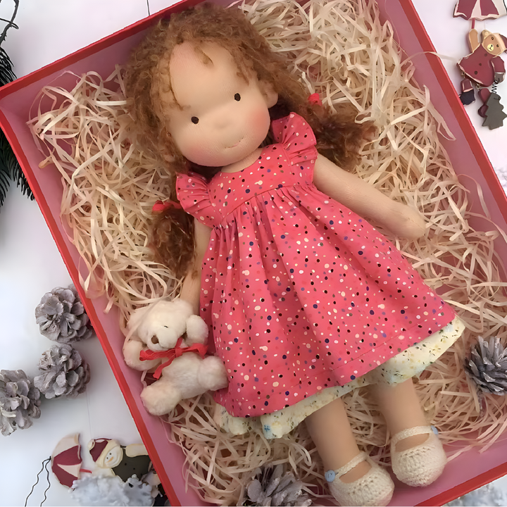 Organic cotton Waldorf doll, a soft and natural cloth toy, perfect for children's play.