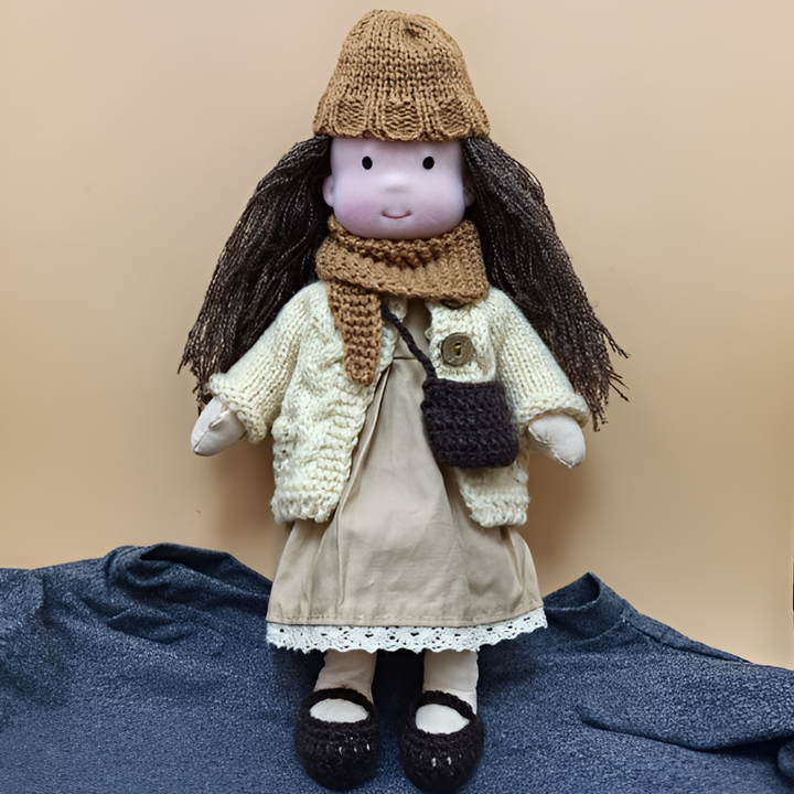Organic cotton Waldorf doll, a natural and soft heirloom toy for thoughtful imaginative play.