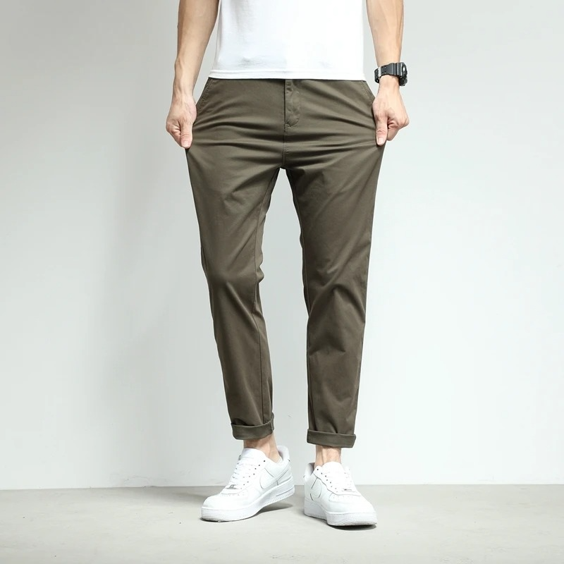 Men's casual slim-fit tech trousers in khaki. Blending comfort, style, and performance for daily wear.