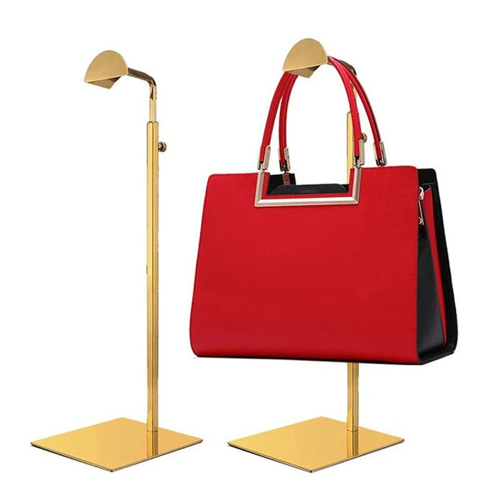 Gold adjustable retail fixture for showcasing luxury purses. Durable stainless steel handbag display stand.