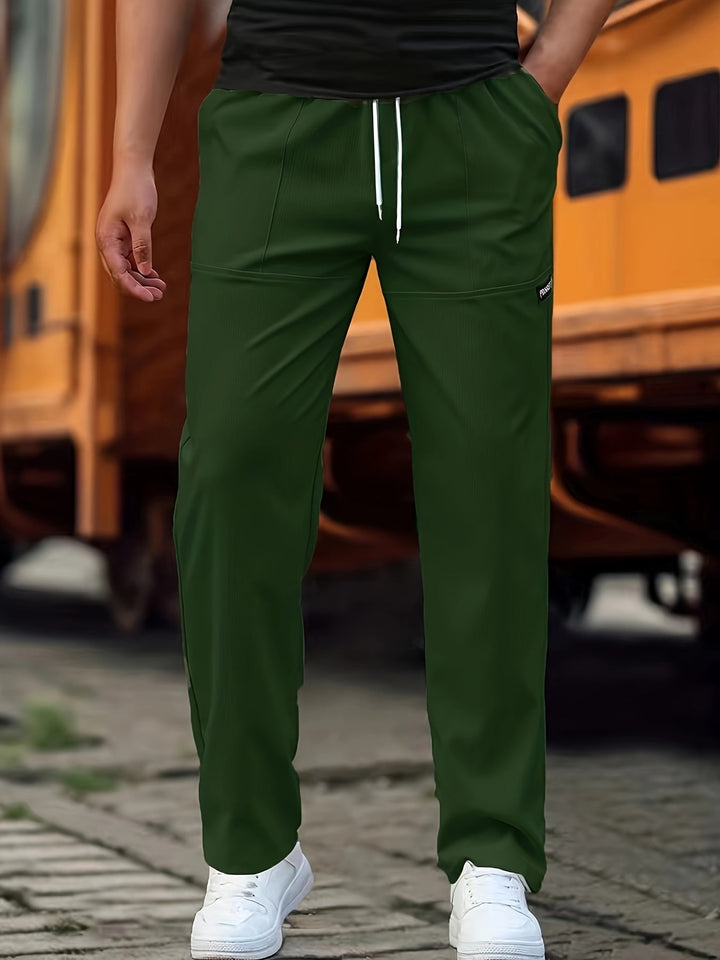 "Herren Alltagshose mit Jogger Design in Dunkelblau, stilvoller Schnitt, bequeme Passform, Baumwollmischung, praktische Tasch