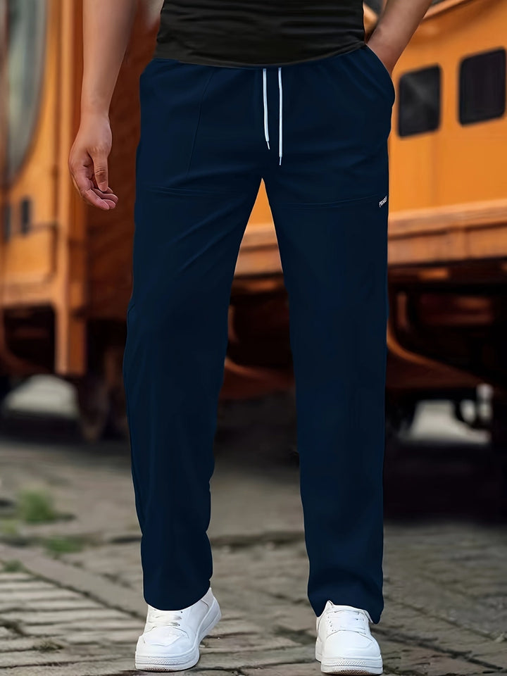 "Herren Alltagshose mit Jogger Design in Dunkelblau, stilvoller Schnitt, bequeme Passform, Baumwollmischung, praktische Tasch