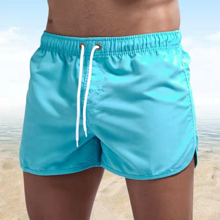 "Herren Badehose, schnell trocknend, modern und komfortabel, mit elastischem Bund und Taschen, ideal für Strandtage."