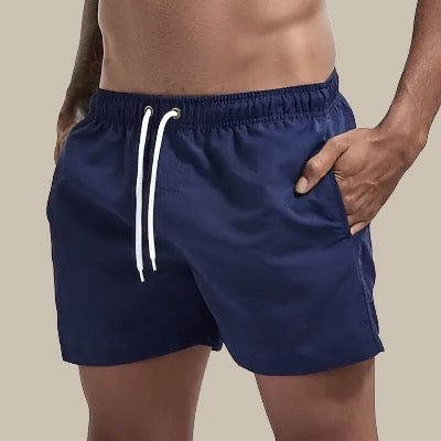 Herren Badeshorts in Türkis, schnelltrocknend, elastischer Bund, klassisches Design; perfekt für Sommeraktivitäten.
