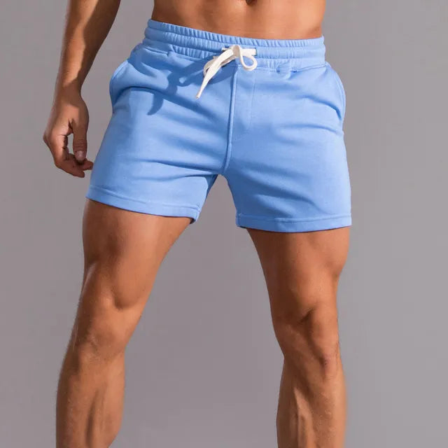 "Herren Baumwoll Shorts mit Seitentaschen, beige, ideal für Sommermode, atmungsaktiv und elegant, klassische Passform."