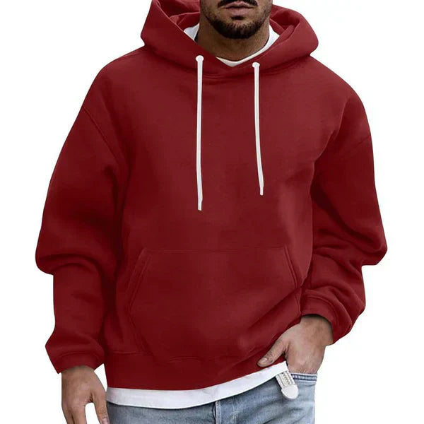 "Herren Kapuzenpullover mit Taschen, leuchtend rot, weicher Stoff, für gemütliche Tage, ideal für casual Outfits."