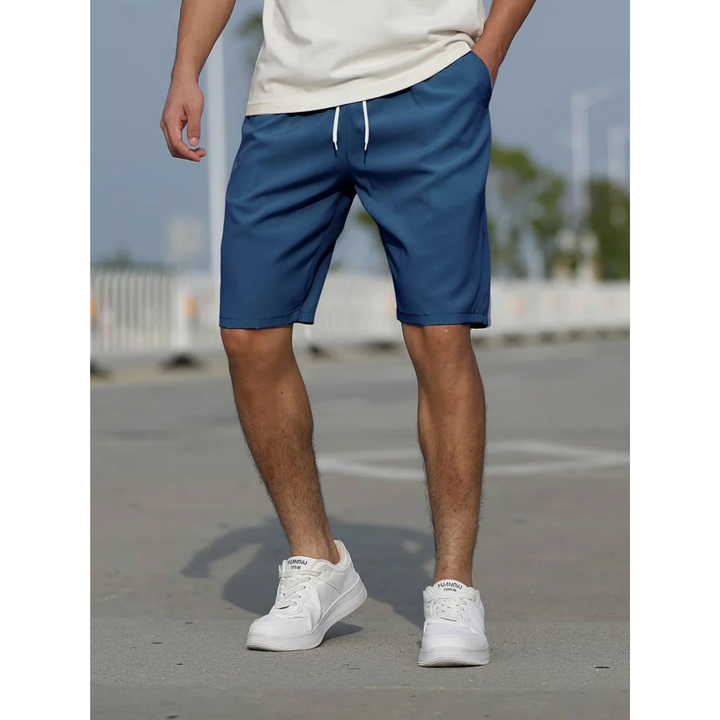 "Herren Sommershorts, atmungsaktiv, locker geschnitten; ideal für Freizeit. Perfekt für warme Tage, mit praktischen Taschen."