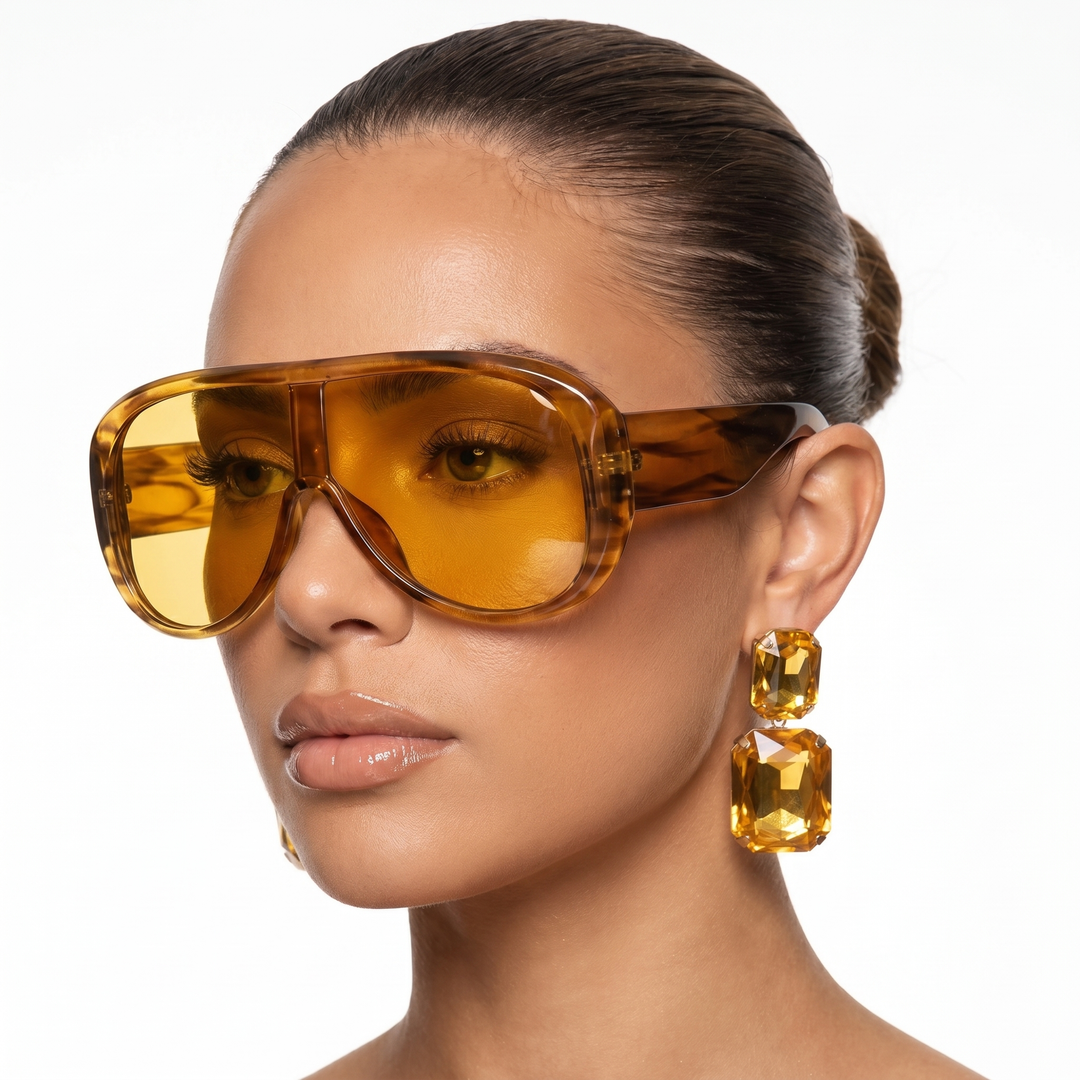 Stylish women's pilot sunglasses, lightweight with UV400 eye protection, perfect for travel.