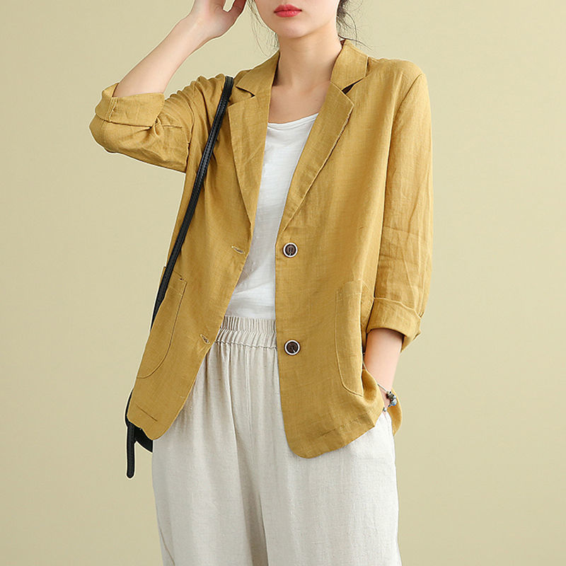 Lightweight linen tailored blazer for women. A chic & versatile layering piece for modern spring and summer fashion.